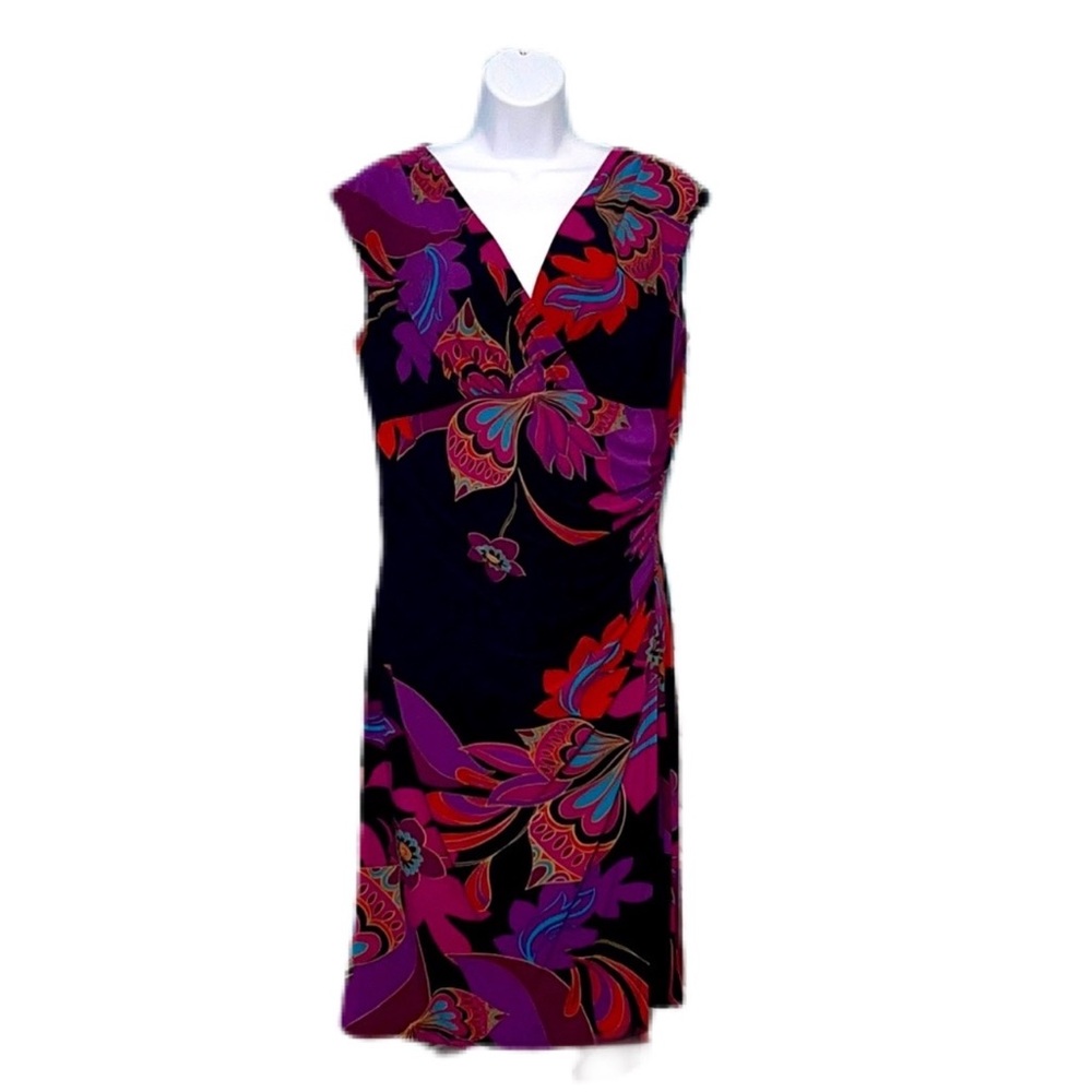 Figure hugging colorful dress.